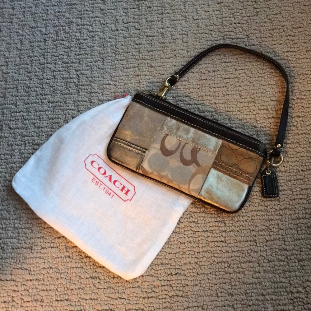 Brown and gold coach wristlet